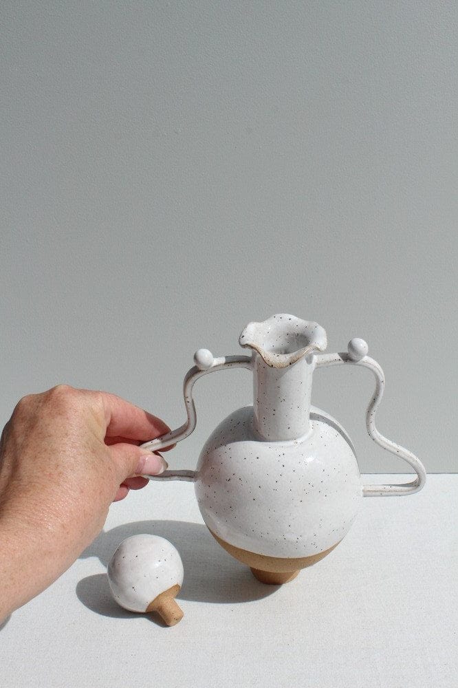 White Vessel With Wiggle Handles And A Stopper