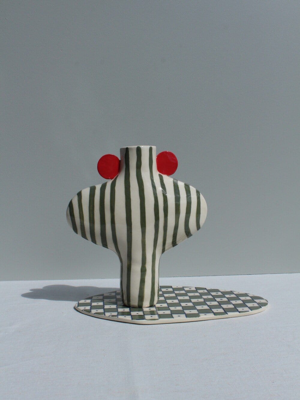 Olive Green Striped Vessel With Red Handles