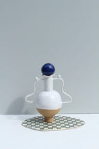 White Vessel With Wiggle Handles And A Stopper