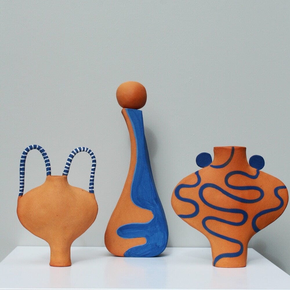 Hand Drawn Vessel In Terracotta And Blue.