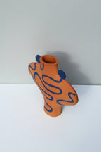 Hand Drawn Vessel In Terracotta And Blue.